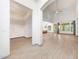 An airy living room featuring high ceilings, tile floors, and an open concept at 3467 N Hooper St, Buckeye, AZ 85396