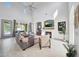 Inviting living room showcasing a cozy fireplace and lots of natural light at 3467 N Hooper St, Buckeye, AZ 85396