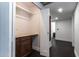 Spacious closet with storage and drawers, seamlessly blending storage with easy access to a well-lit hallway at 3646 W Brown St, Phoenix, AZ 85051