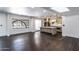 Kitchen with white cabinets, stainless steel appliances, an island and an open floorplan at 3646 W Brown St, Phoenix, AZ 85051
