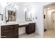 This main bathroom features dual sinks, updated hardware, and a separate shower room at 3646 W Brown St, Phoenix, AZ 85051