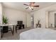 Spacious bedroom with carpet floors, a ceiling fan and a workspace at 3783 E Stiles Ln, Gilbert, AZ 85295