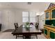Inviting dining area featuring a classic table, ample lighting, and a welcoming atmosphere at 3783 E Stiles Ln, Gilbert, AZ 85295