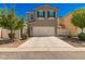 Charming two-story home featuring a two-car garage, green shutters, and a well-manicured front yard at 3783 E Stiles Ln, Gilbert, AZ 85295