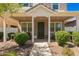 Inviting front porch offers a relaxing outdoor space with comfortable seating and lush landscaping at 3783 E Stiles Ln, Gilbert, AZ 85295