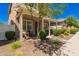 Welcoming front porch with seating area, a beautiful tree, and a cozy spot for outdoor relaxation at 3783 E Stiles Ln, Gilbert, AZ 85295