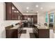 Spacious kitchen boasts granite countertops, stainless steel appliances, and ample cabinet space at 3783 E Stiles Ln, Gilbert, AZ 85295