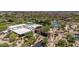 This aerial shot features resort-style amenities including a community center, tennis courts, and swimming pool at 3824 E Parkside Ln, Phoenix, AZ 85050