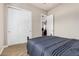 Bedroom featuring a closet, an entrance and neutral paint at 3824 E Parkside Ln, Phoenix, AZ 85050