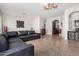 Bright living room with large windows and a comfortable L-shaped sofa at 3824 E Parkside Ln, Phoenix, AZ 85050