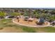 Aerial view of the playground with shade canopies, a fun and safe place for children to play in the community at 3824 E Parkside Ln, Phoenix, AZ 85050
