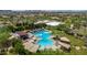 Aerial view of the stunning community pool, featuring various lounge areas and plenty of room for residents at 3824 E Parkside Ln, Phoenix, AZ 85050