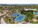 Aerial view of tennis courts showcasing the community's recreational amenities, perfect for active residents at 3824 E Parkside Ln, Phoenix, AZ 85050