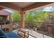 Balcony view with table and cushioned chair at 3935 E Rough Rider Rd # 1164, Phoenix, AZ 85050