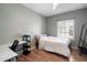 Bedroom featuring a desk and a window with shutters at 3935 E Rough Rider Rd # 1164, Phoenix, AZ 85050