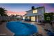 Inviting backyard pool with covered patio, perfect for outdoor entertaining at 4136 W Hearn Rd, Phoenix, AZ 85053