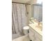 Neutral bathroom featuring a shower, toilet, and vanity with marble-look countertop at 4201 E Camelback Rd # 51, Phoenix, AZ 85018