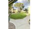 Lush community courtyard with walking paths, mature trees, and well-manicured lawns at 4201 E Camelback Rd # 51, Phoenix, AZ 85018