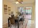 Inviting dining room with sliding glass doors to a patio with outdoor seating at 4201 E Camelback Rd # 51, Phoenix, AZ 85018