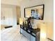 Bright entryway with tiled floors, modern decor, and a stylish console table at 4201 E Camelback Rd # 51, Phoenix, AZ 85018