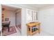 Bright kitchen showcasing butcher block island and open view into dining room through shuttered window at 4201 E Camelback Rd # 51, Phoenix, AZ 85018