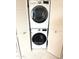 Laundry closet with full size stackable washer and dryer at 4201 E Camelback Rd # 51, Phoenix, AZ 85018