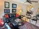 Cozy living room with comfortable seating, stylish decor, and access to the dining area at 4201 E Camelback Rd # 51, Phoenix, AZ 85018