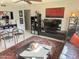 Comfortable living room featuring a ceiling fan, unique decor, and a stylish area rug at 4201 E Camelback Rd # 51, Phoenix, AZ 85018