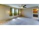 Bright bedroom with neutral walls and soft carpet flooring, offering a cozy and comfortable space at 4201 W Hatcher Rd, Phoenix, AZ 85051