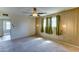 This is a bright bedroom with multiple windows that let in a lot of natural light at 4201 W Hatcher Rd, Phoenix, AZ 85051