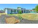Home exterior with a garden bed in the front yard, adding to the curb appeal at 4201 W Hatcher Rd, Phoenix, AZ 85051