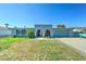 Charming single-story home with a xeriscaped front yard and appealing architectural details at 4201 W Hatcher Rd, Phoenix, AZ 85051