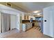 Spacious kitchen with tiled flooring, complete with stainless steel appliances and white cabinetry at 4201 W Hatcher Rd, Phoenix, AZ 85051