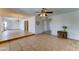 Bright living room with tile flooring and neutral walls, creating a spacious and inviting atmosphere at 4201 W Hatcher Rd, Phoenix, AZ 85051