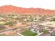 A bird's eye view highlights the estate's pool and lush landscaping at 4304 W Calle Poco --, Laveen, AZ 85339