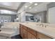 Bright bathroom boasts double sinks, soaking tub, and a large mirror with great lighting at 4304 W Calle Poco --, Laveen, AZ 85339