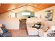 Carpeted bonus room with vaulted wood ceiling and raised sleeping area at 4304 W Calle Poco --, Laveen, AZ 85339