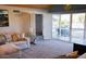 Spacious living room with balcony, vaulted ceiling, and comfortable seating area at 4304 W Calle Poco --, Laveen, AZ 85339