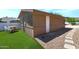 Outbuilding with artificial turf and rock landscaping at 4304 W Calle Poco --, Laveen, AZ 85339