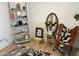 Bedroom decor featuring a ladder shelf and a unique leather chair, creating a stylish space at 4925 W Bluefield Ave, Glendale, AZ 85308