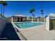 Community pool featuring a refreshing pool and a covered seating area at 4925 W Bluefield Ave, Glendale, AZ 85308