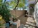 Cozy front yard patio with chairs and garden decor at 4925 W Bluefield Ave, Glendale, AZ 85308