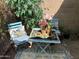 Charming seating area with table and chairs, perfect for relaxing outdoors at 4925 W Bluefield Ave, Glendale, AZ 85308
