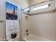 Bright, clean bathroom with a shower and a window for natural light at 5085 S Ponderosa Dr, Gilbert, AZ 85298