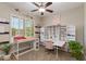 Bright craft room with ample storage and a large window at 5085 S Ponderosa Dr, Gilbert, AZ 85298