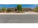 Charming single-story home with well-manicured desert landscaping and a spacious two-car garage at 5085 S Ponderosa Dr, Gilbert, AZ 85298
