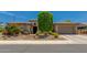 Stunning single-story home featuring desert landscaping, a two-car garage, and a welcoming front entrance at 5085 S Ponderosa Dr, Gilbert, AZ 85298
