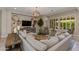 Inviting living room with a large sectional sofa, stylish decor, and a cozy atmosphere at 5085 S Ponderosa Dr, Gilbert, AZ 85298