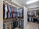 Organized walk-in closet with clothing racks and shelving provides ample storage space at 5085 S Ponderosa Dr, Gilbert, AZ 85298