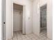 This hallway includes a linen closet and a bathroom with a mirrored shower door at 548 W Linda Ln, Chandler, AZ 85225